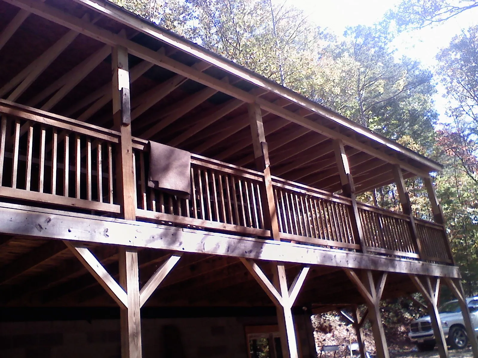 Timber framing under a new elevated porch and deck — Roof Leak Repair in District Heights by Roofing Brothers